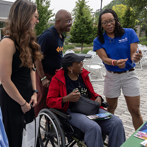 Visitors learn about the Great Rivers Greenway